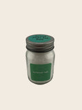 Jar of British Flake Sea Salt with a green label on a gray background