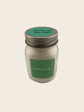 Jar of California Sea Salt with a green label on a beige background