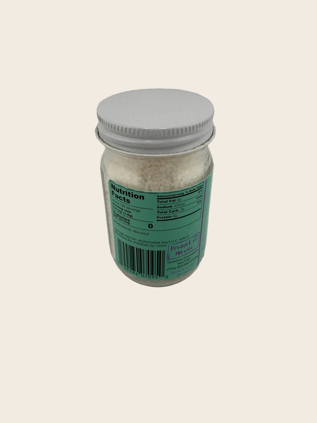 Jar with a green label on a white background