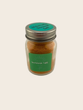 Jar of Worldwide Salt with a green label on a white background