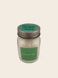Jar of Philippine Sea Salt on a neutral background
