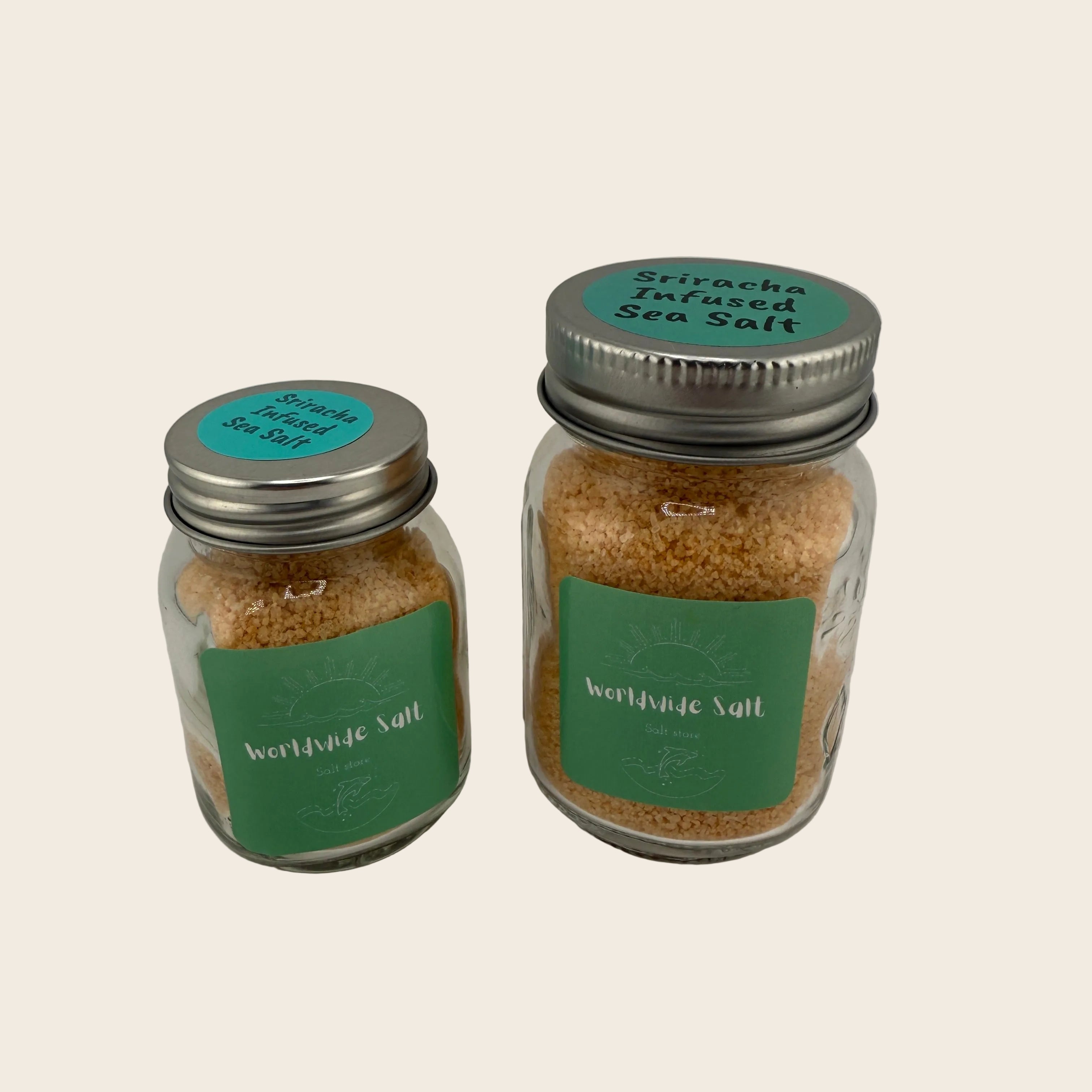 Two jars of Worldwide Salt with green labels on a gray background